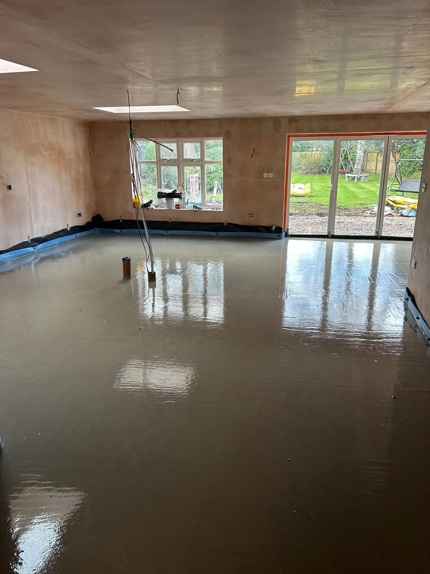 Underfloor heating pipes laid out and ready for a liquid screed pour